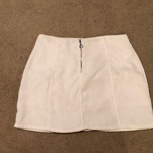 White skirt.